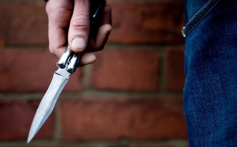 Young men threatened with knives