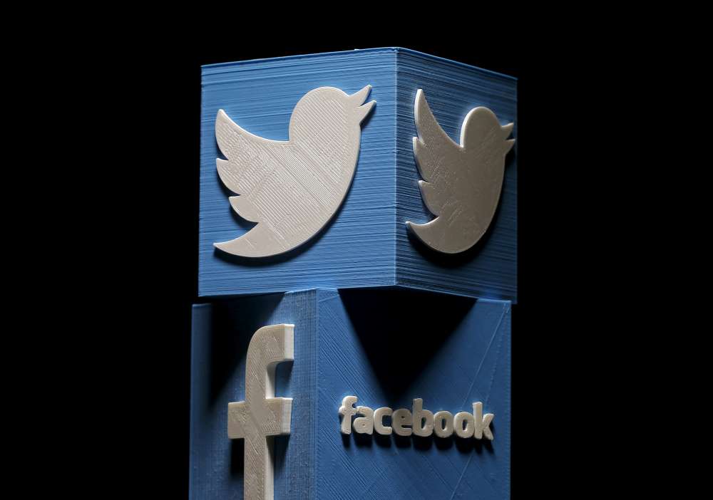 Twitter bans political ads; Facebook's Zuckerberg defends them
