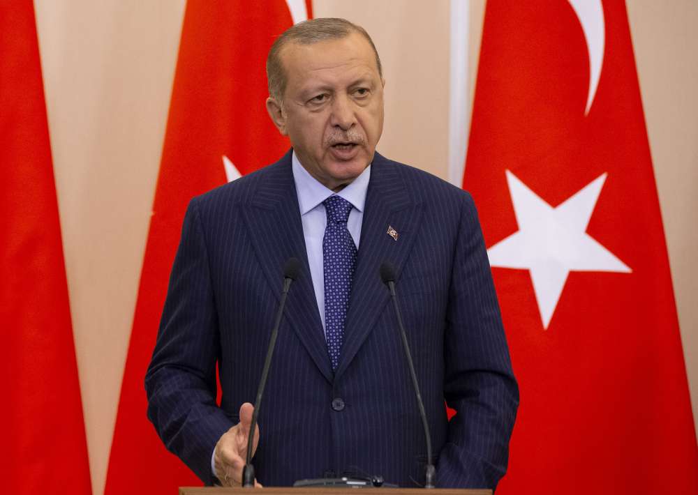 Erdogan says to keep up election challenge but Turkey must move on