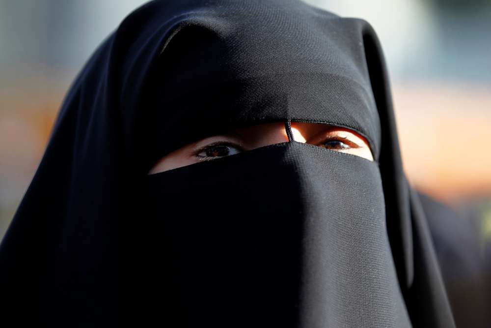France's ban on full-body Islamic veil violates human rights - U.N. rights panel