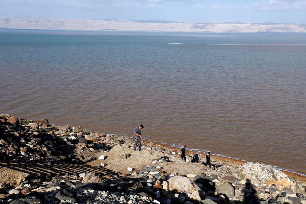 Search for survivors after Jordan floods kill 20 people