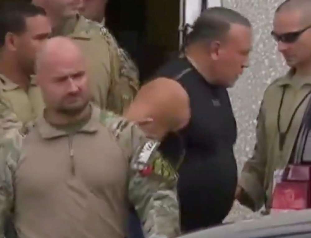 Florida man charged after bombs sent to Trump critics (photos)