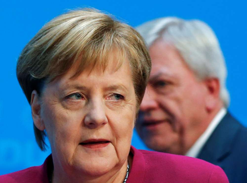 End of era beckons as Merkel says she will give up CDU party chair