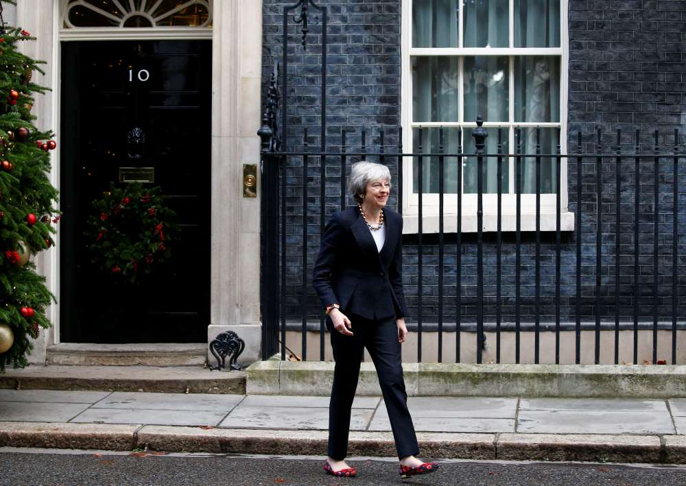 British PM May to request short delay to Brexit