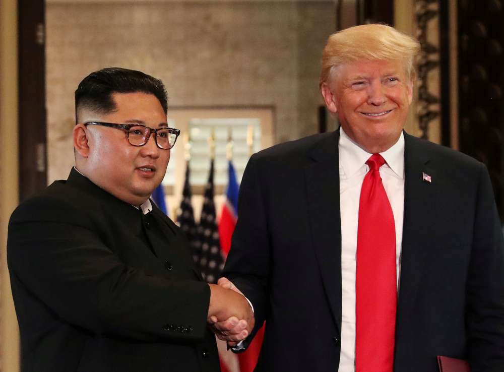 N.Korea's Kim says ready to meet Trump but warns of 'new path'