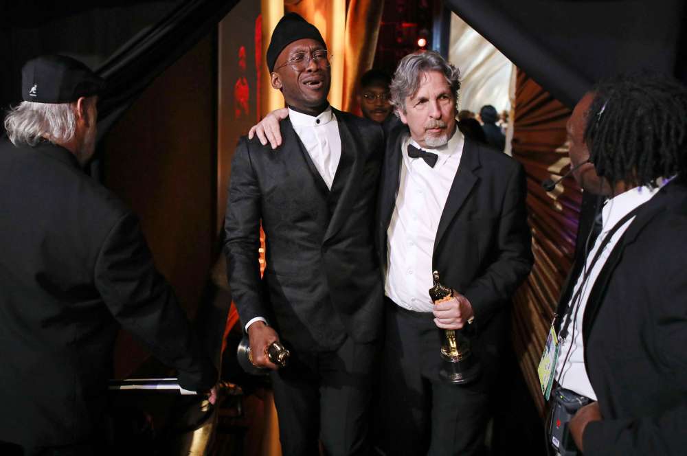 'Green Book' denies Netflix top Oscar on night of music and diversity