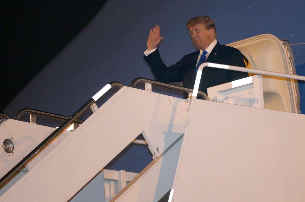 Trump lands in Vietnam for second summit with N.Korea's Kim