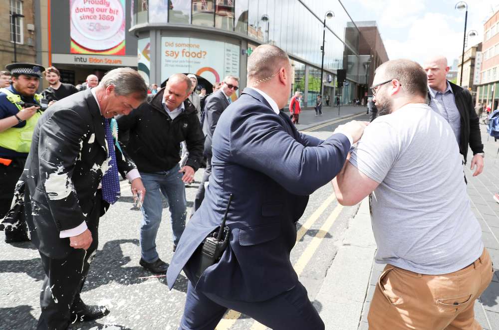Brexit Party's Nigel Farage doused with milkshake on campaign