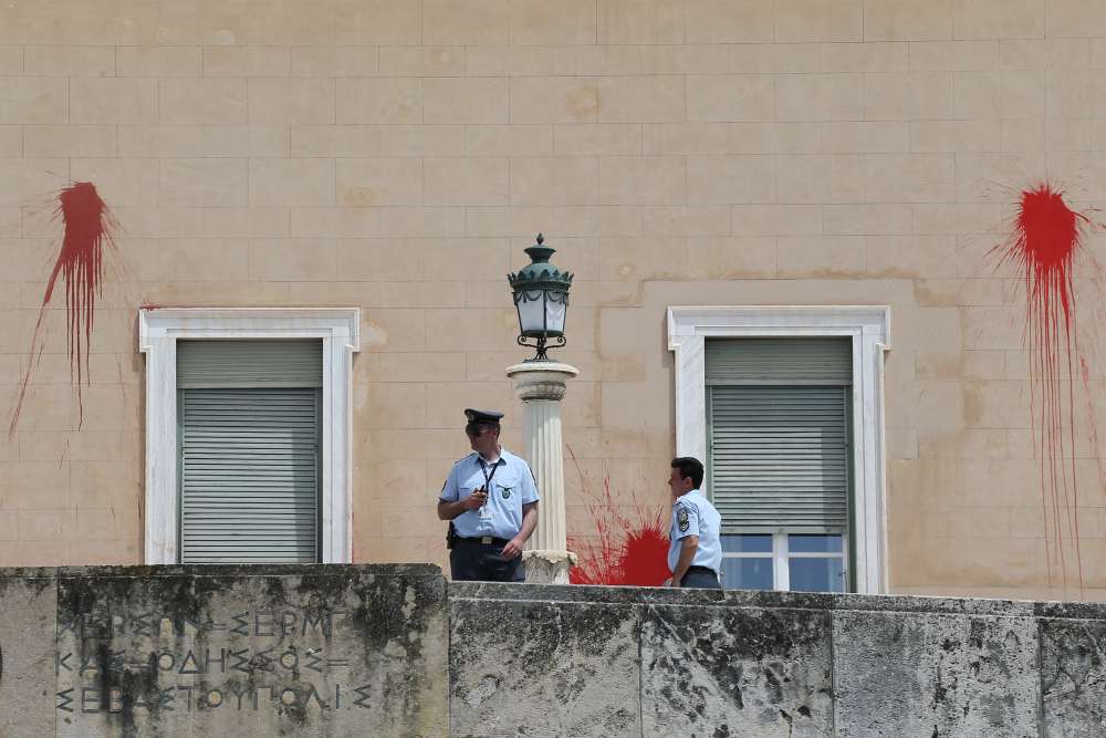 Attackers throw red paint at Greece's parliament