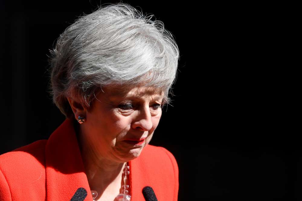 Tearful May says she will step down on June 7 (video)