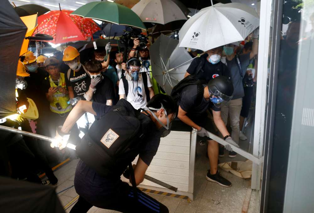 Hong Kong descends into chaos as protesters storm legislature