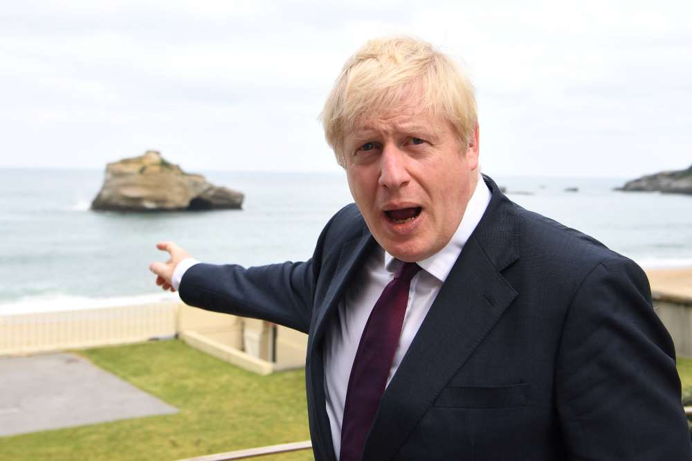 Sink or Swim? UK's Johnson takes G7 ocean dip