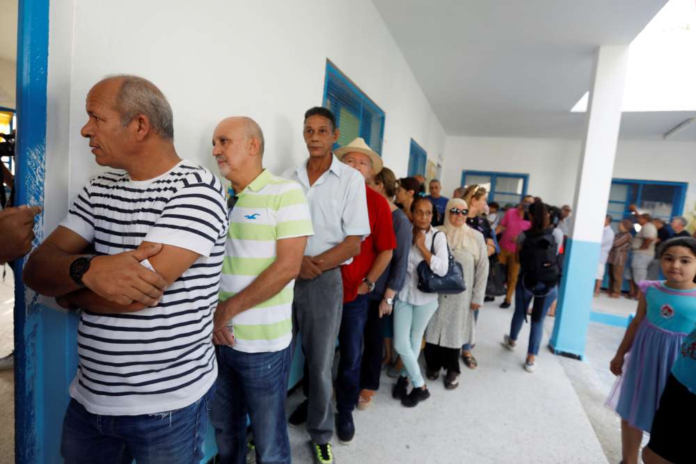 Tunisians vote in competitive presidential election