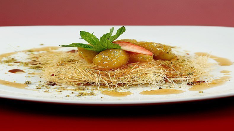 Bananas with butterscotch sauce in kataifi nests