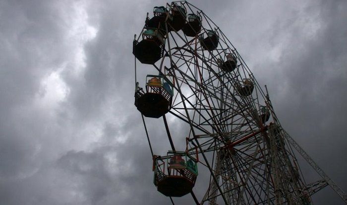 Ten-year-old girl dies as carriage flies off a Ferris wheel and crashes to the ground in India (Video)