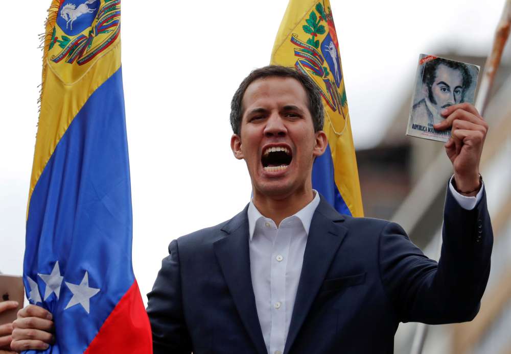 Maduro rival Guaido claims Venezuela presidency with U.S. backing