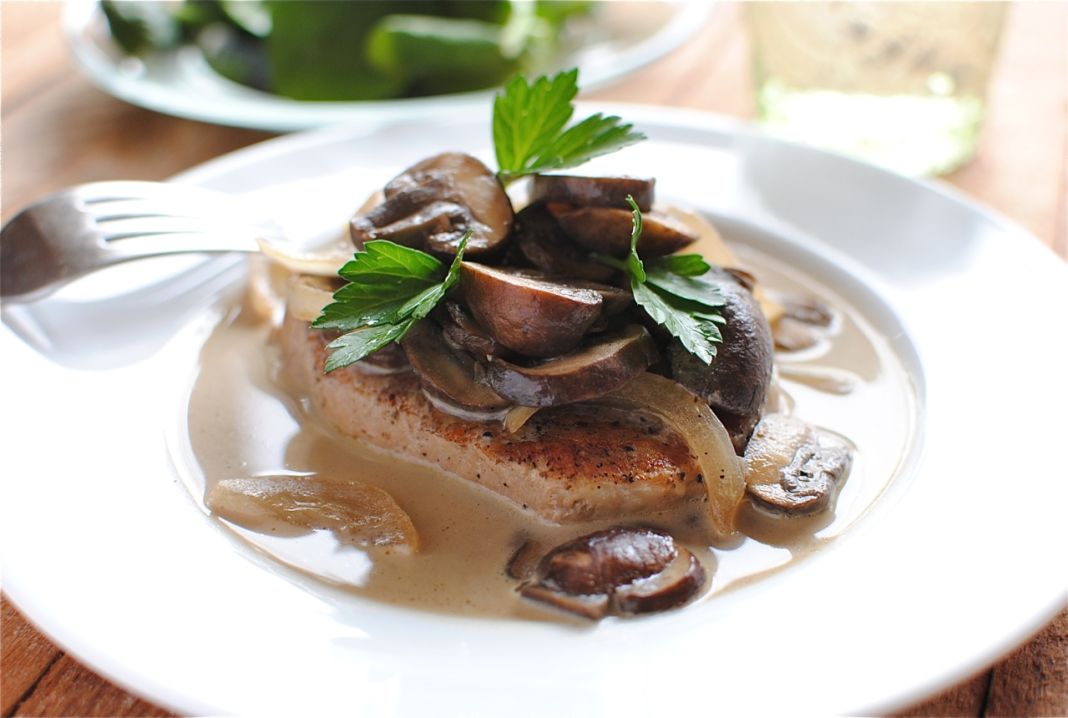 Pork in wine with mushrooms and olives