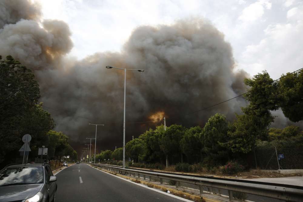 Greece battles raging forest fires