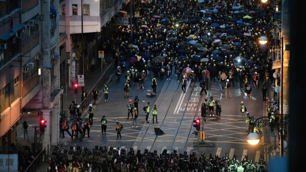 Protesters gather in Hong Kong as rival rally supports police