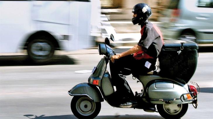 Two teenagers arrested over knife-point theft of delivery man's motorcycle