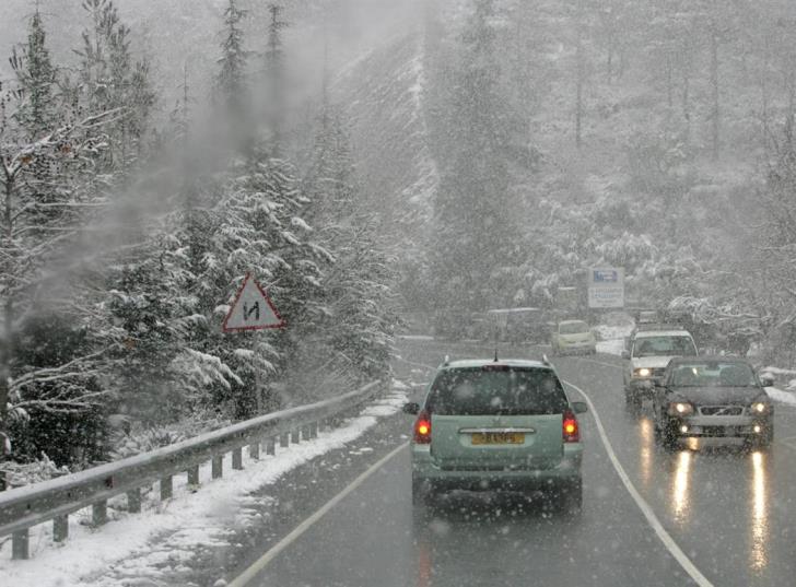 Roads to Troodos open but slippery; more showers