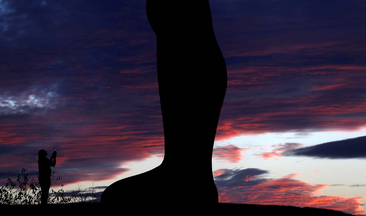 People Visit The Angel Of The North At Sunset In Gateshead