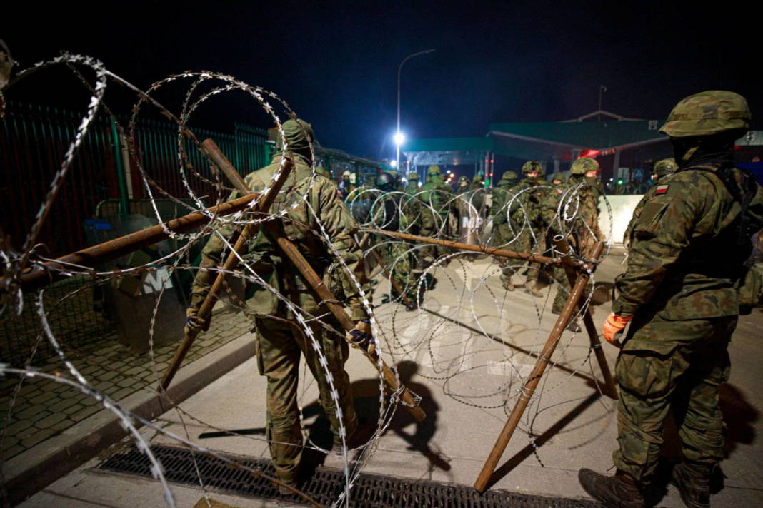 Polish Territorial Defence Forces Build Additional Razor Wire Fence Where Hundreds Of Migrants Camp At The Belarus Side Of Kuznica Bialostocka Bruzgi Border Crossing