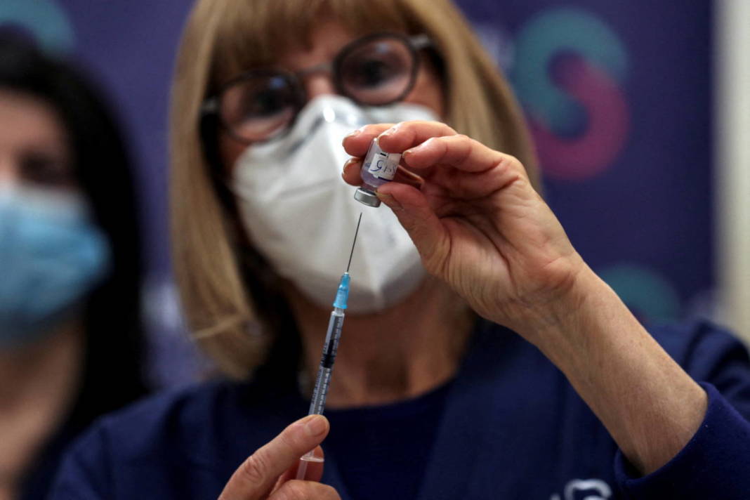 File Photo: A Nurse Prepares A Fourth Dose Of Coronavirus Disease (covid 19) Vaccine As Part Of A Trial In Israel, As Health Ministry Is Considering Offering The Second Booster To The Elderly And Immunocompromised, At Sheba Medical Center In Ramat Gan