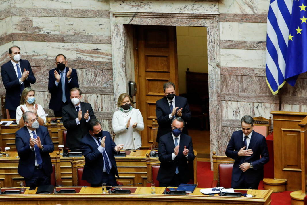 Greek Pm Mitsotakis Acknowledges Receives From Ministers Of His Government After Speech During A Parliamentary Session Before A Confidence Vote In Athens