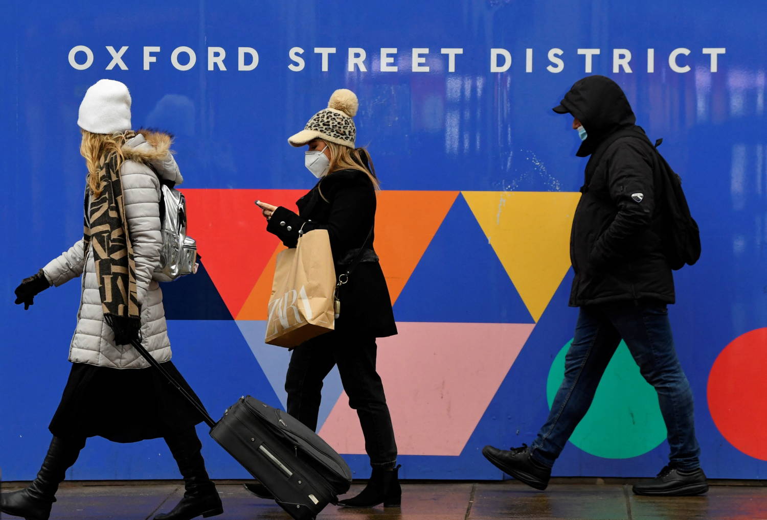 Shoppers Walk On Oxford Street As Rules On Wearing Face Coverings In Some Settings In England Are Relaxed, Amid The Spread Of The Coronavirus Disease (covid 19) Pandemic, In London
