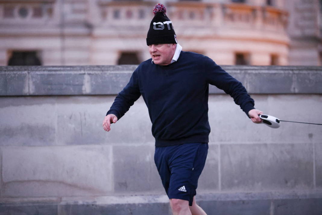 British Prime Minister Boris Johnson Jogging In St James's Park In London