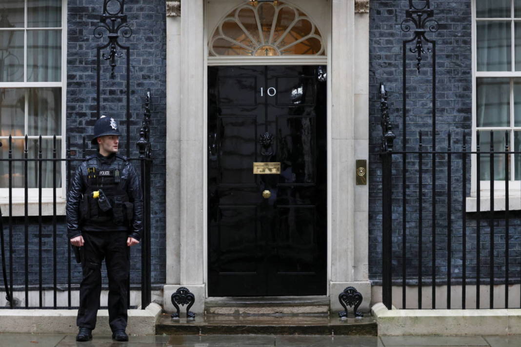 A Police Officer Stands Outside 10 Downing Street In London