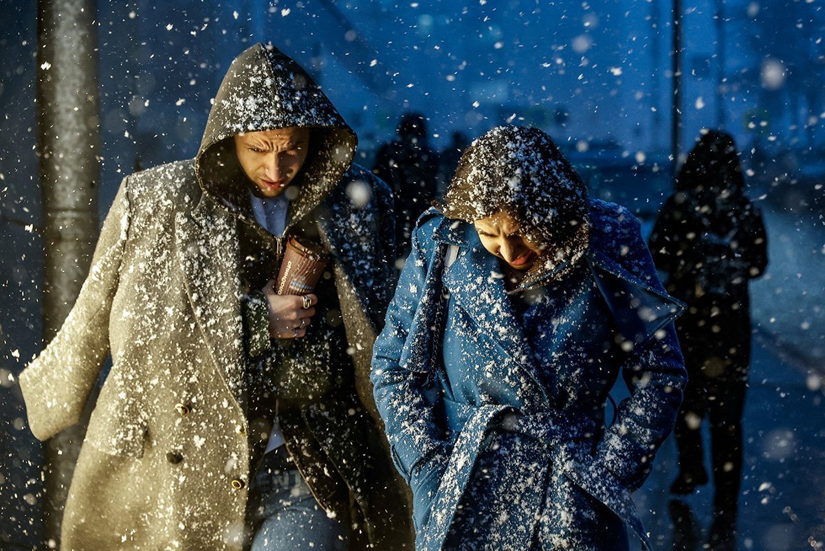 People Walk In The Street During Heavy Snowfall In Moscow