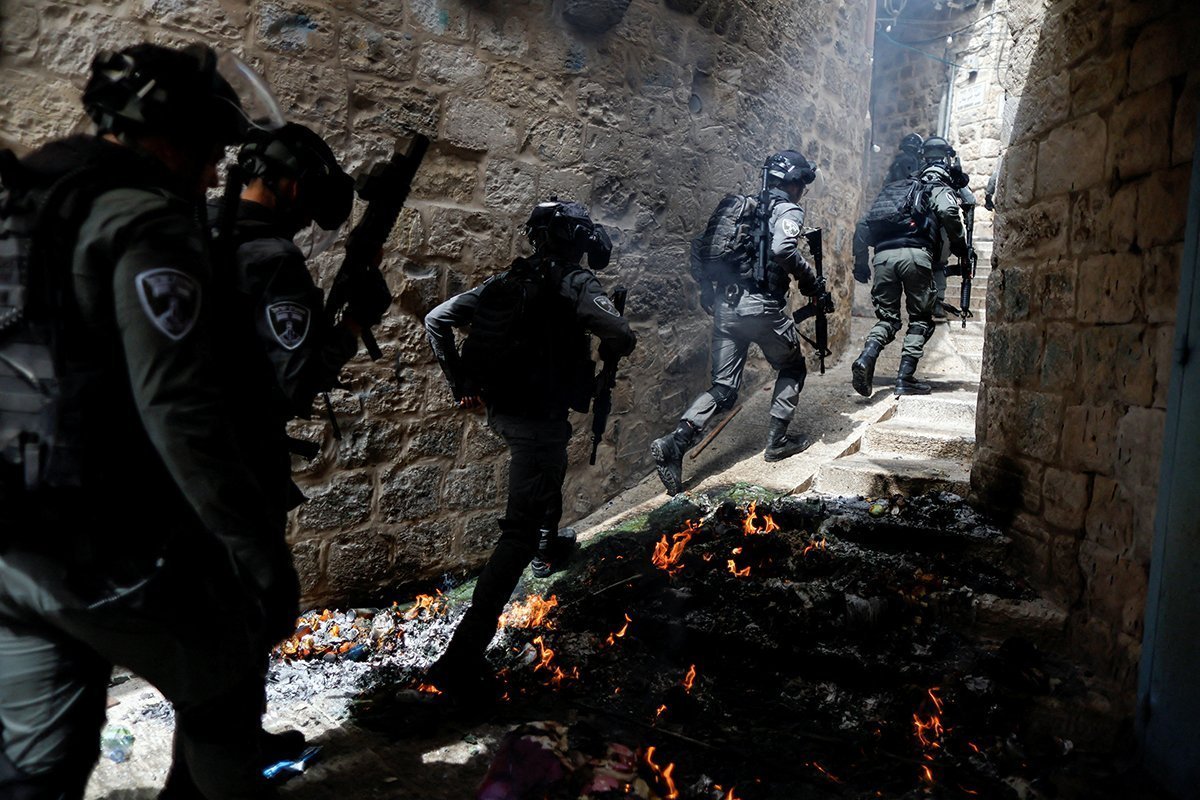 Israeli Border Police Force Patrol An Alley In Jerusalem's Old City