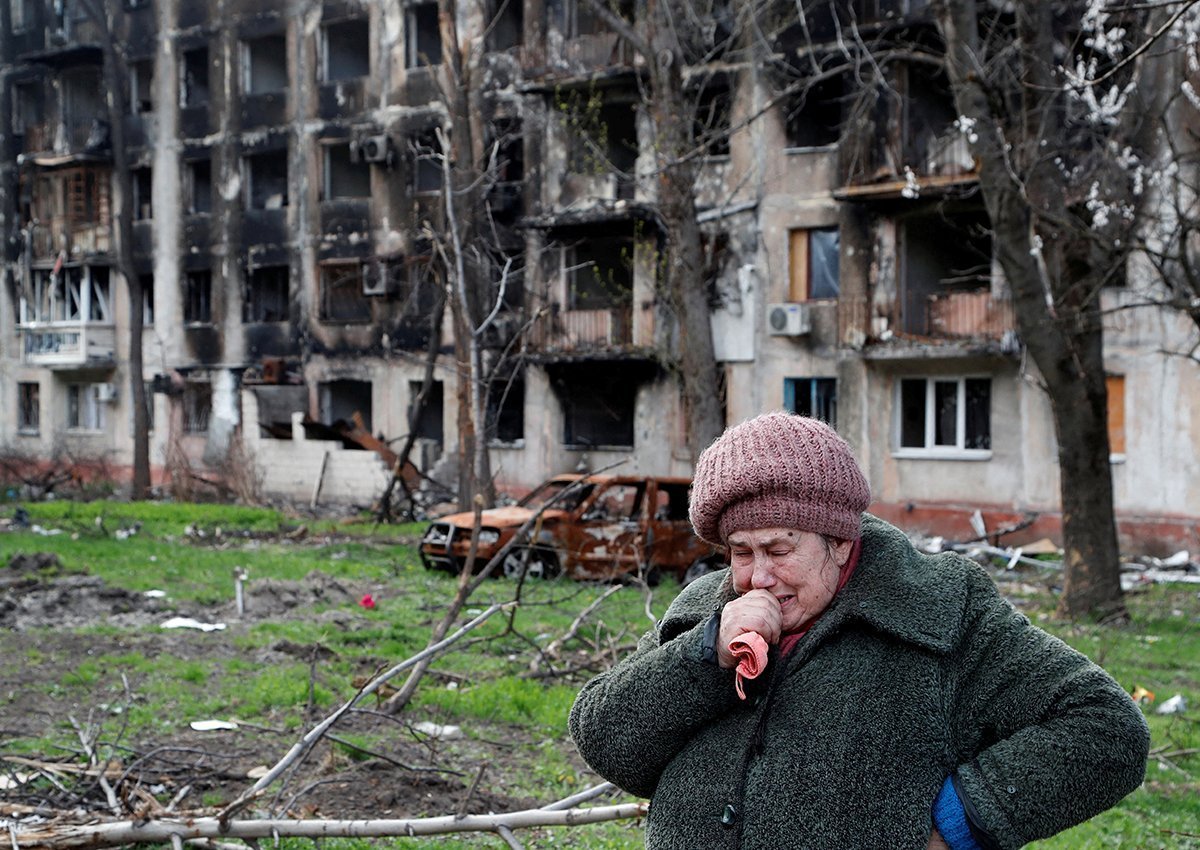 Local Resident Tamara Cries In Front Of A Destroyed Apartment Building In Mariupol