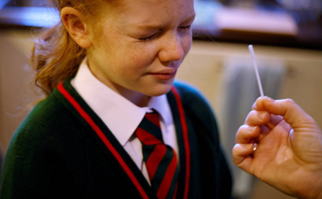 File Photo: A Girl Takes A Covid 19 Lateral Flow Self Test Ahead Of Returning To School, Amid The Coronavirus Disease (covid 19) Outbreak In Manchester