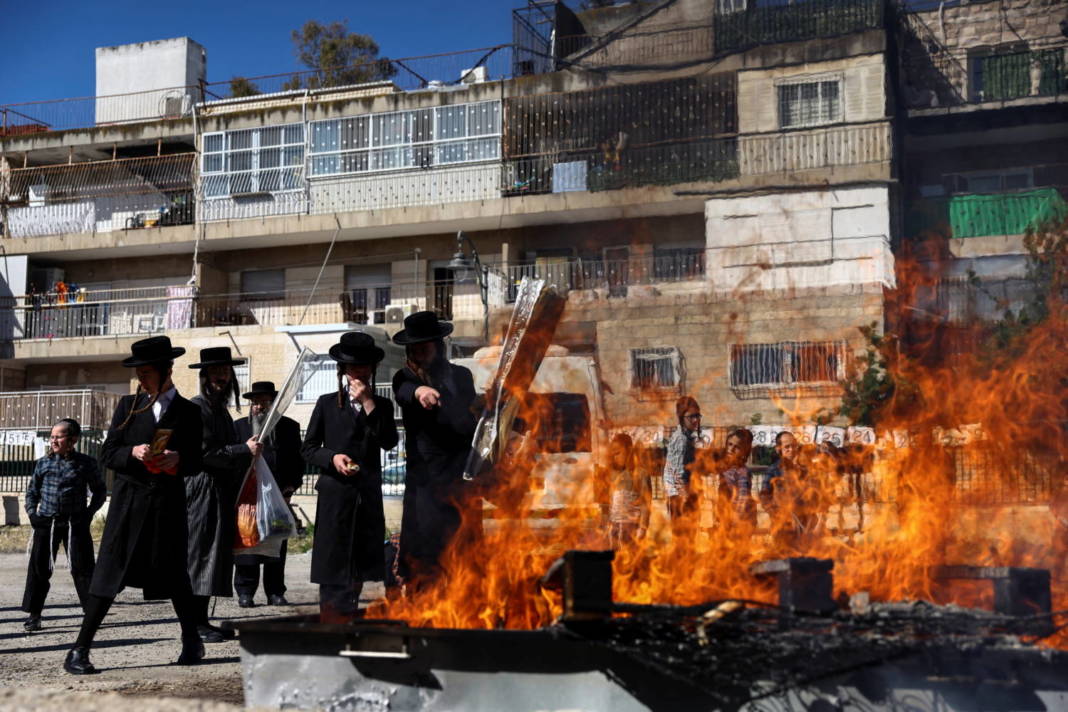Ultra Orthodox Jews Burn Leavened Bread Ahead Of The Upcoming Jewish Holiday Of Passover In The Mea Shearim Neighbourhood Of Jerusalem