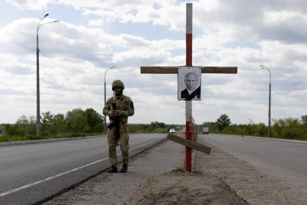 A Portrait Of Russian President Vladimir Putin In A Cross Depicting His Tomb Is Seen At A Checkpoint Outside Dnipro