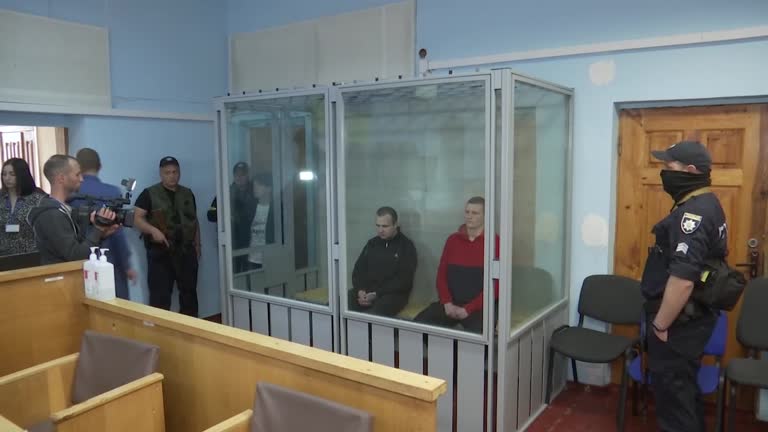 Ukrainian Court Jails Two Russian Soldiers For War Crimes