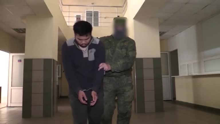Russian Media Show Two Men They Say Are U.s. Citizens Captured In Ukraine
