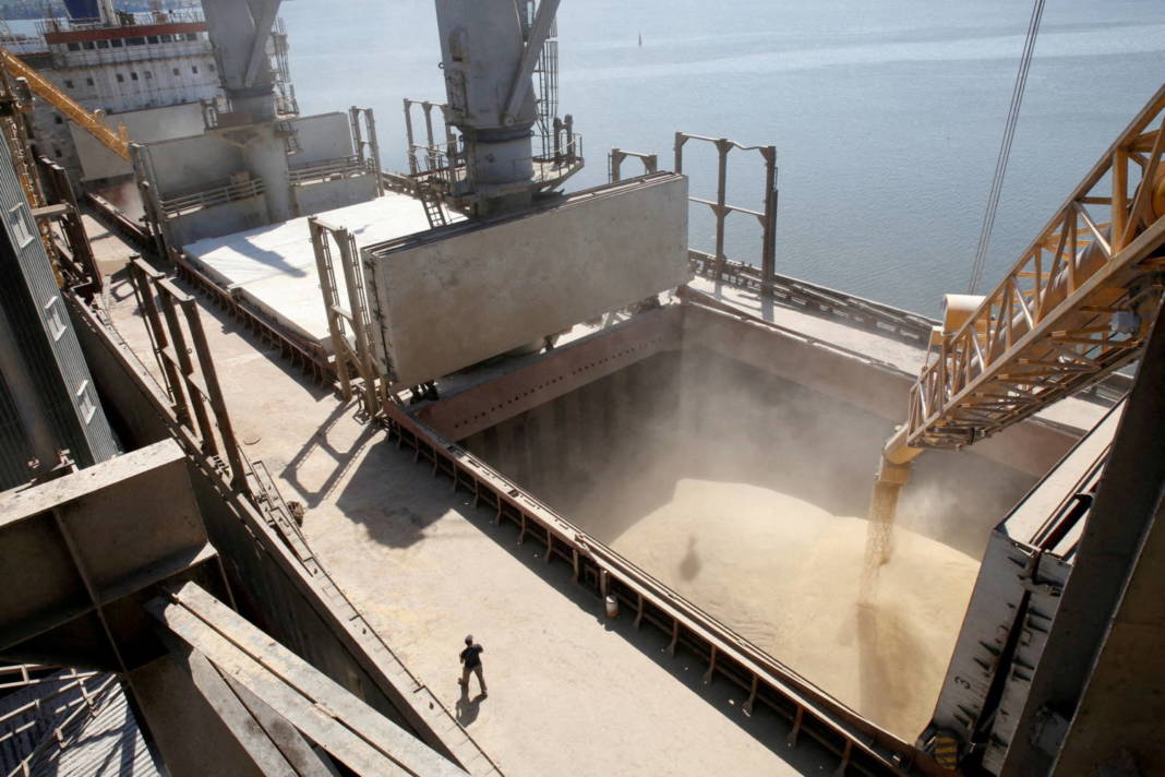 File Photo: File Photo: A Dockyard Worker Watches As Barley Grain Is Poured Into A Ship In Nikolaev