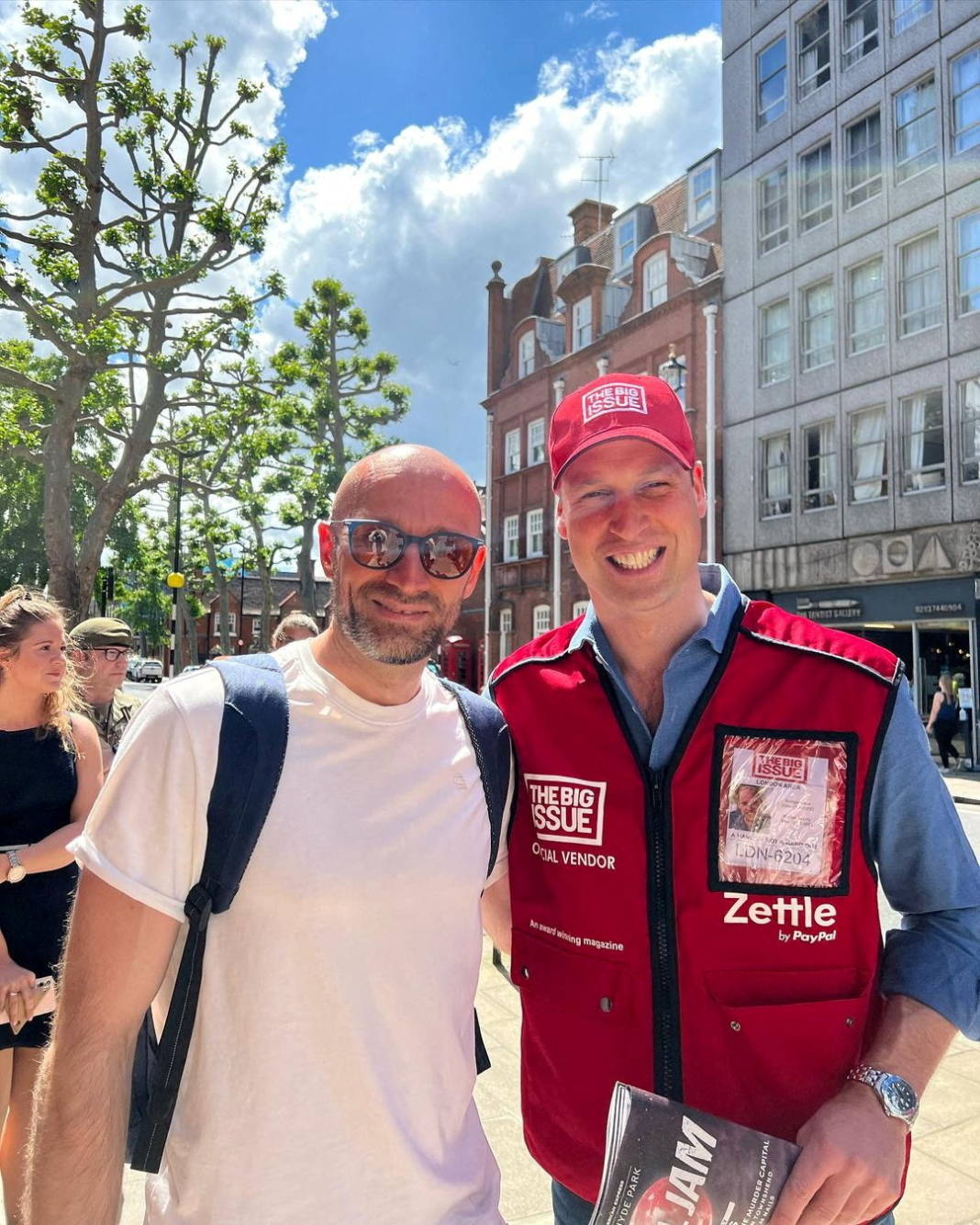 Vitalijus Zuikauskas Poses For A Picture With Britain's Prince William, Who Was Spotted Selling The Big Issue Newspaper In London