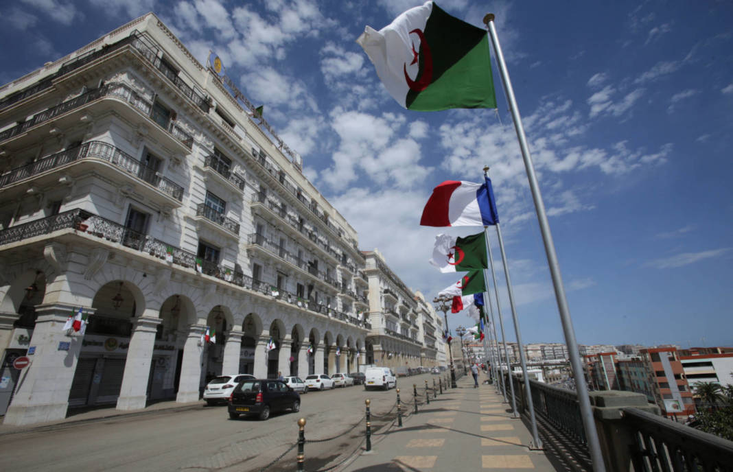 Vehicles Pass Algerian And French Flags, Ahead Of The Arrival Of French President Emmanuel Macron In Algiers