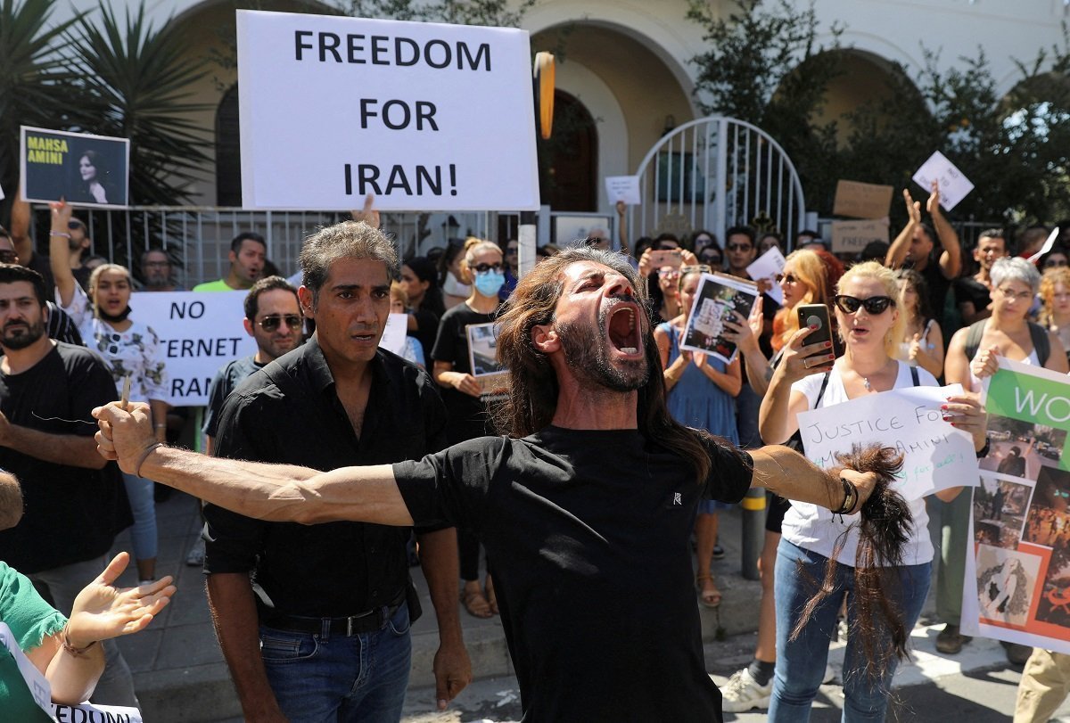A Demonstrator Cuts His Hair During A Protest Following The Death Of Mahsa Amini In Iran, In Nicosia,