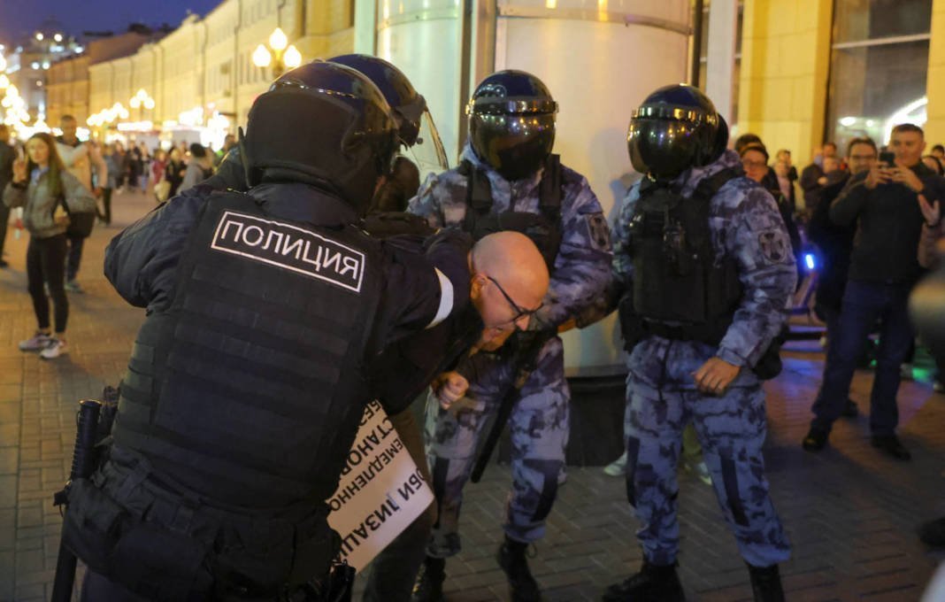 Russian Police Officers Detain A Participant During An Unsanctioned Rally In Moscow