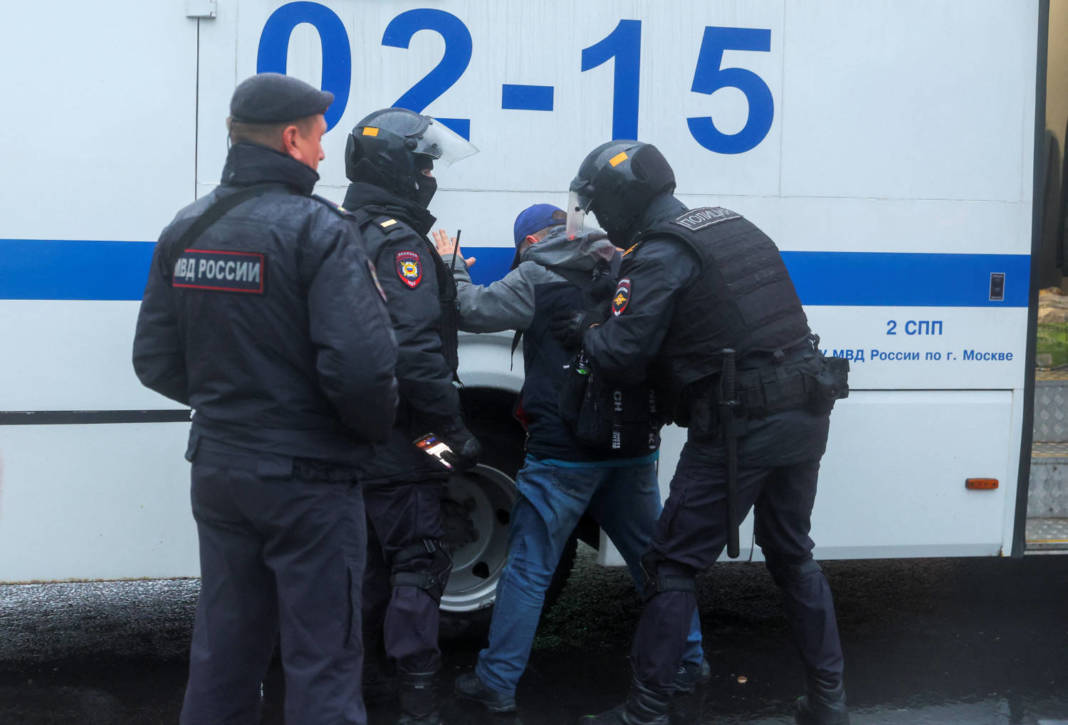 Russian Police Officers Detain A Person During A Rally In Moscow
