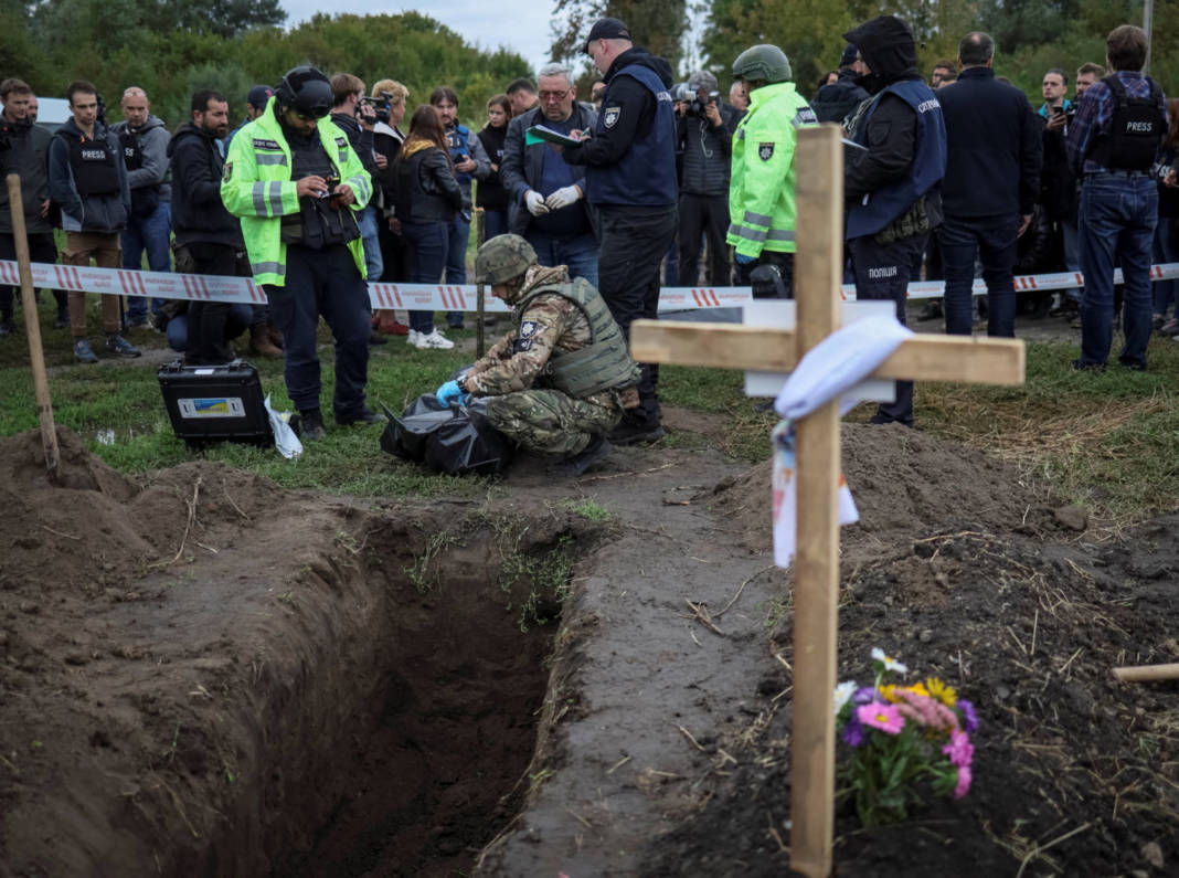 Police Experts Exhume The Body Of A Person Who, According To Ukrainian Police, Was Killed By Russian Troops During Russia's Invasion, In The Town Of Balakliia
