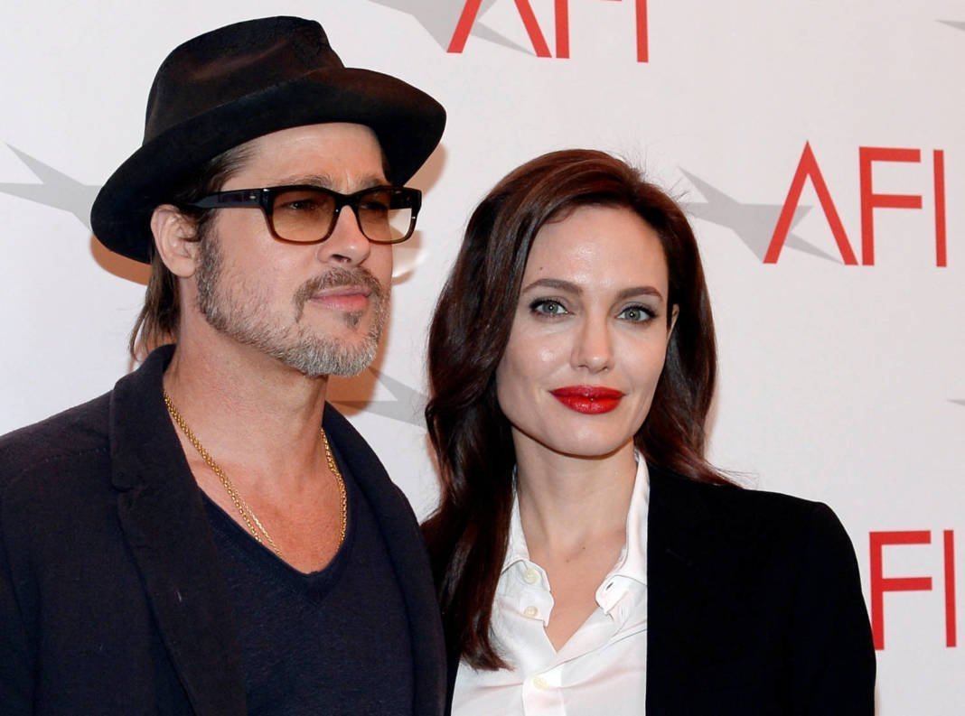 File Photo: Actor Brad Pitt And Actress/director Angelina Jolie Pose At The Afi Awards 2014 Honoring Excellence In Film And Television In Beverly Hills