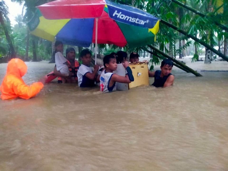 Rescue Operation Following Flood Due To Tropical Storm Nalgae In Philippines