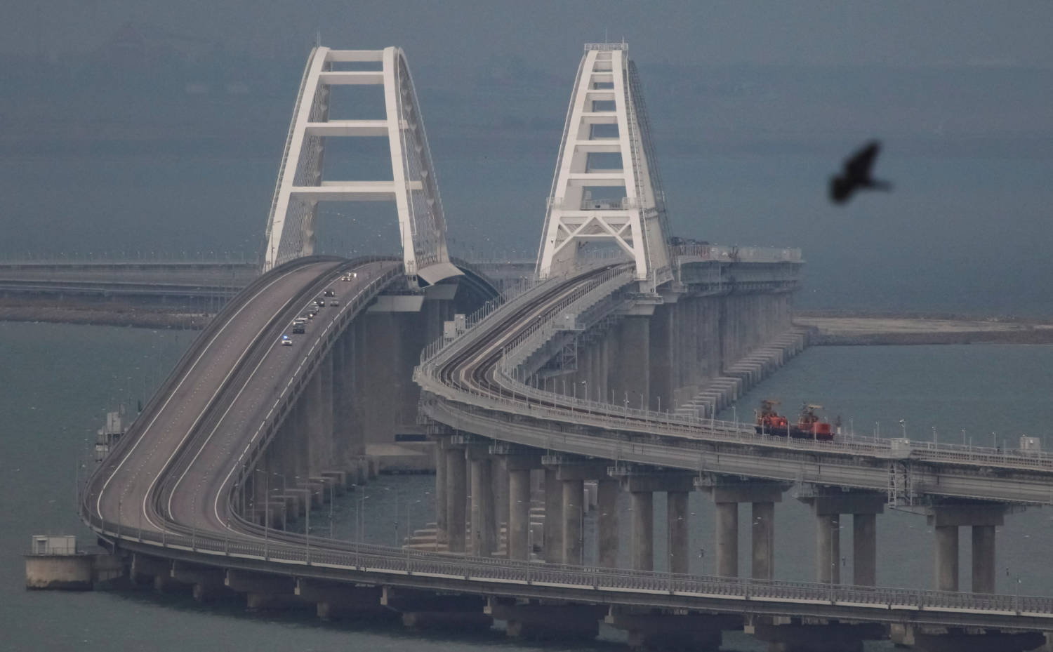 Passenger Cars Drive On The Kerch Bridge, After An Explosion Destroyed Part Of It, In The Kerch Strait, Crimea